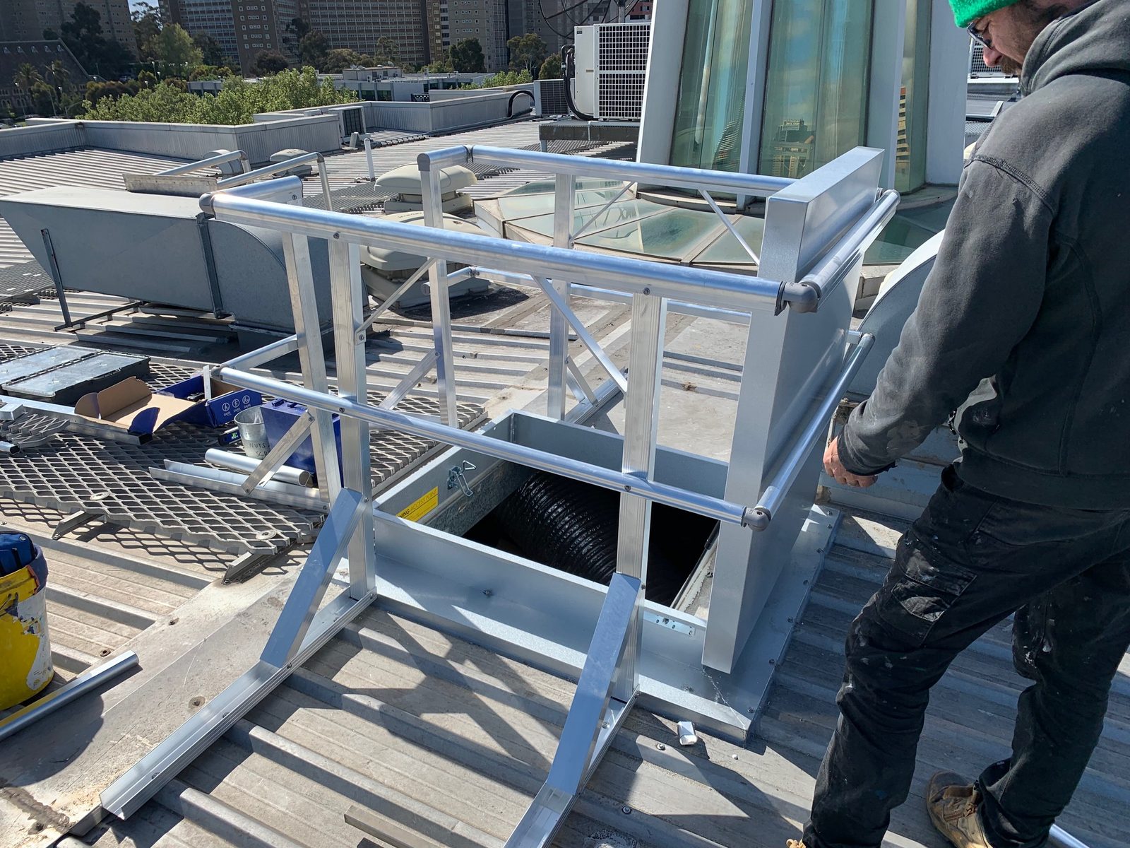 Mission Possible height safety guardrail system installed around a rooftop access hatch